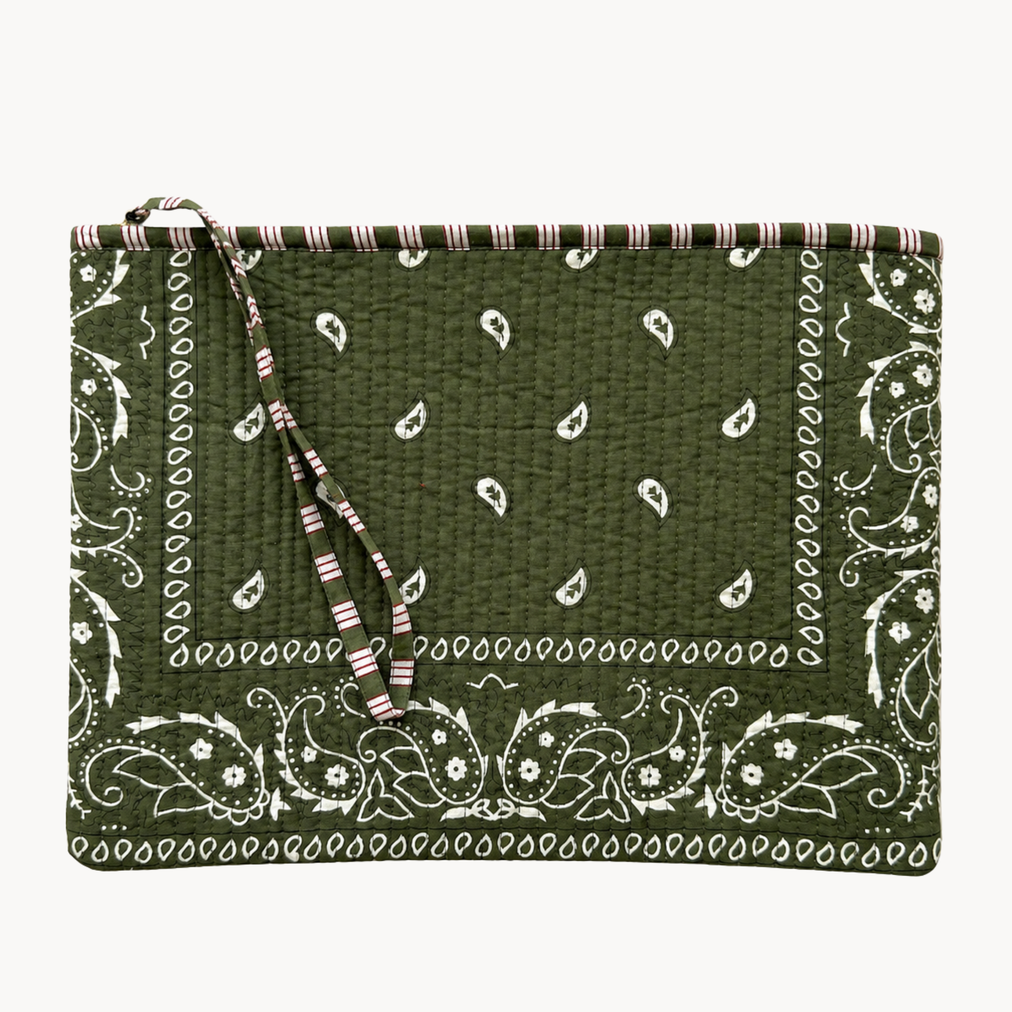 quilted paisley waterproof pouch with wrist strap on a white background, perfect for travel, makeup, toiletries, or wet swimsuits after the beach or pool