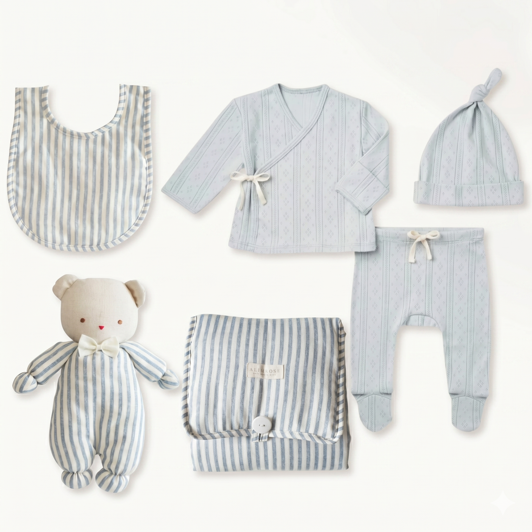Newborn baby boy gift set with blue pointelle take home from the hospital outfit, bib, blanket, and plush toy