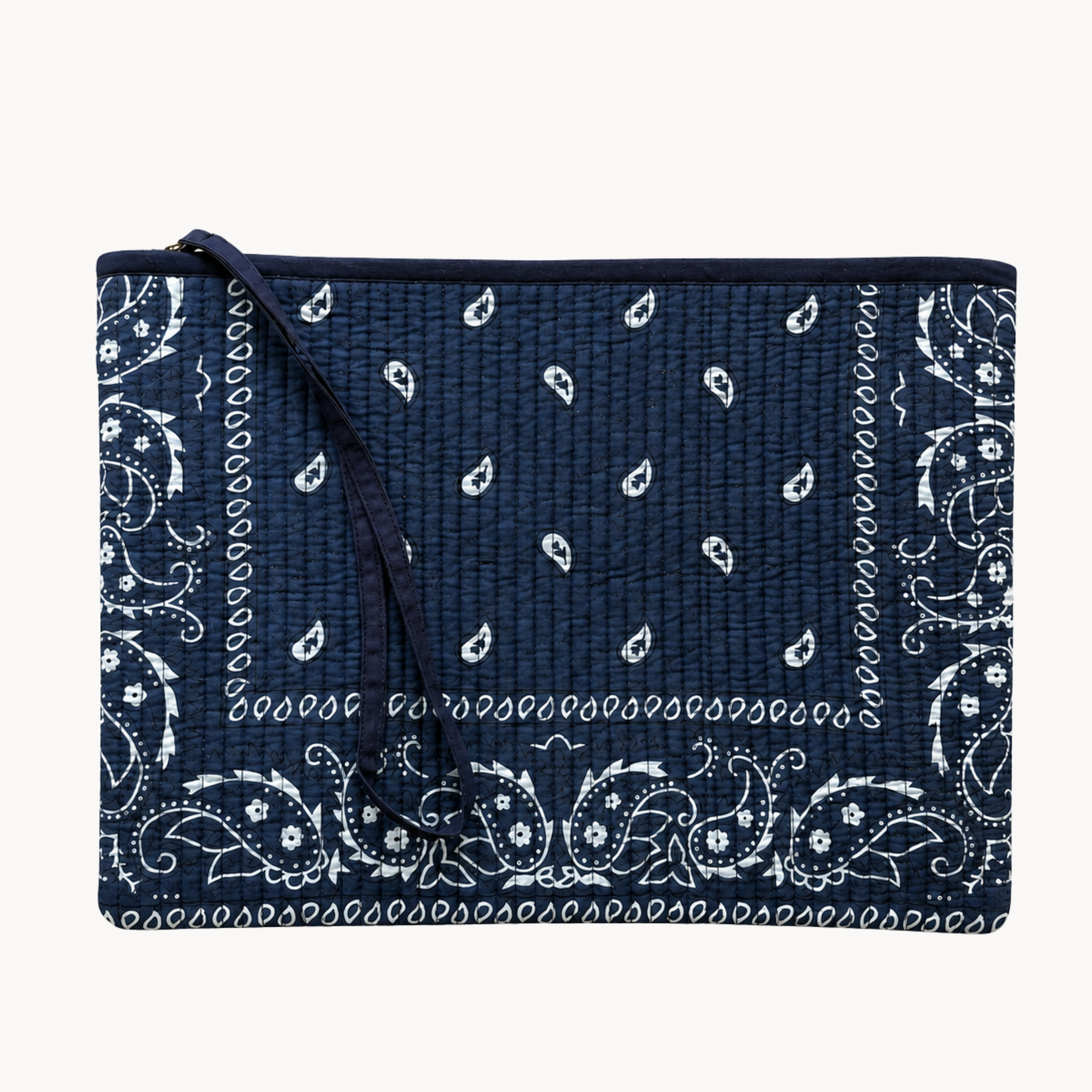 quilted paisley waterproof pouch with wrist strap on a white background, perfect for travel, makeup, toiletries, or wet swimsuits after the beach or pool