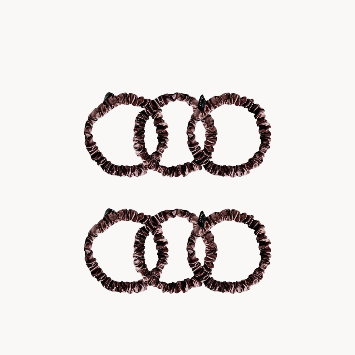 Set of six brown drowsy hair scrunchies on a white background