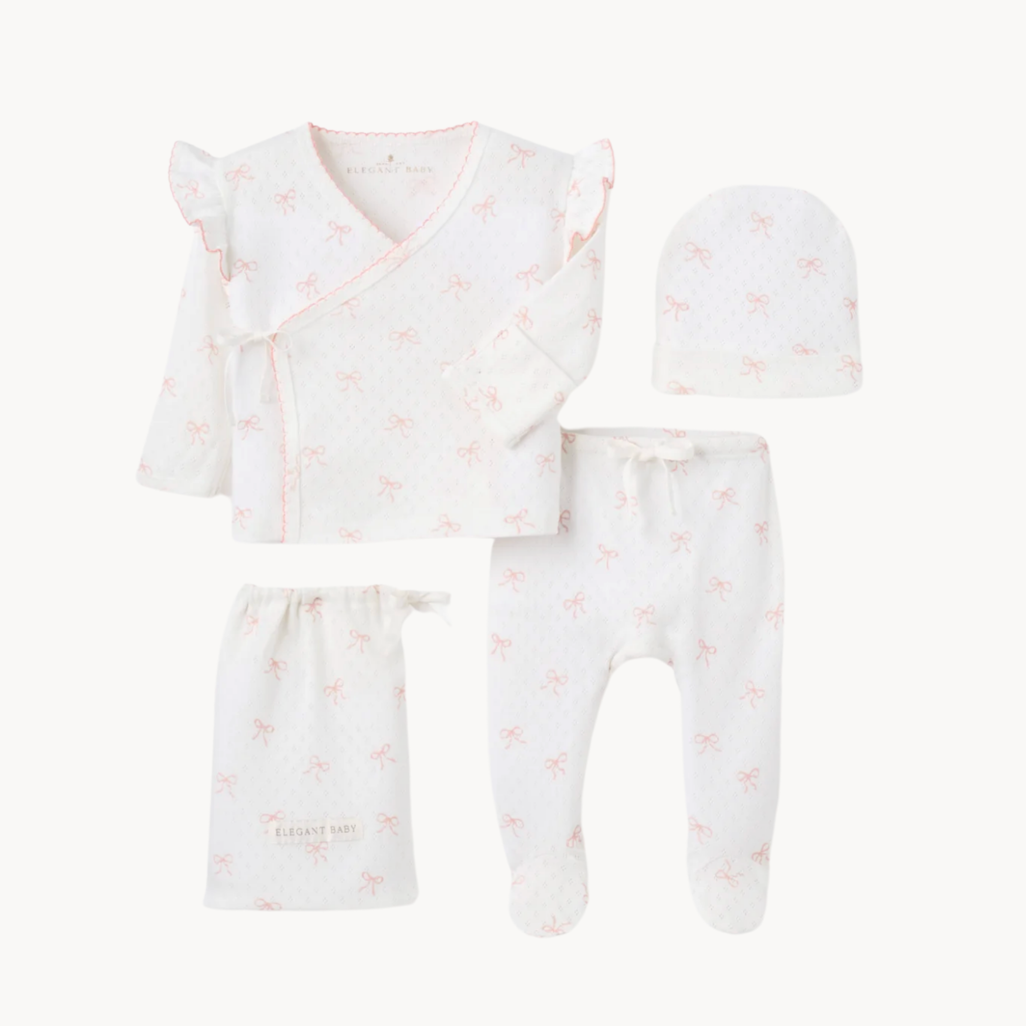 pink bow organic cotton baby 3-piece set with kimono top, footed pants, and beanie for newborn comfort and gifting